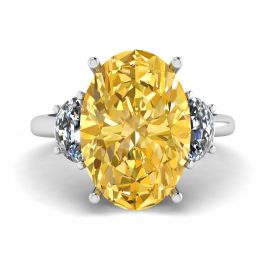 Ring mit ovalem gelbem Diamant und seitlichem Halbmond aus weißen Diamanten aus Weißgold