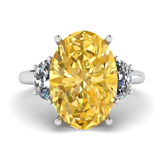 Ring mit ovalem gelbem Diamant und seitlichem Halbmond aus weißen Diamanten aus Weißgold, Bild vergrößern 1