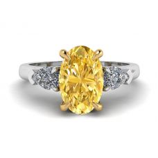Ovaler Ring mit gelbem Diamant und seitlichem, birnenförmigem, weißem Diamantring