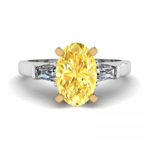 Ovaler gelber Diamant mit seitlich weißem Baguette-Ring